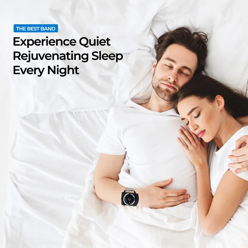 Couple resting in bed, man wearing the wristband